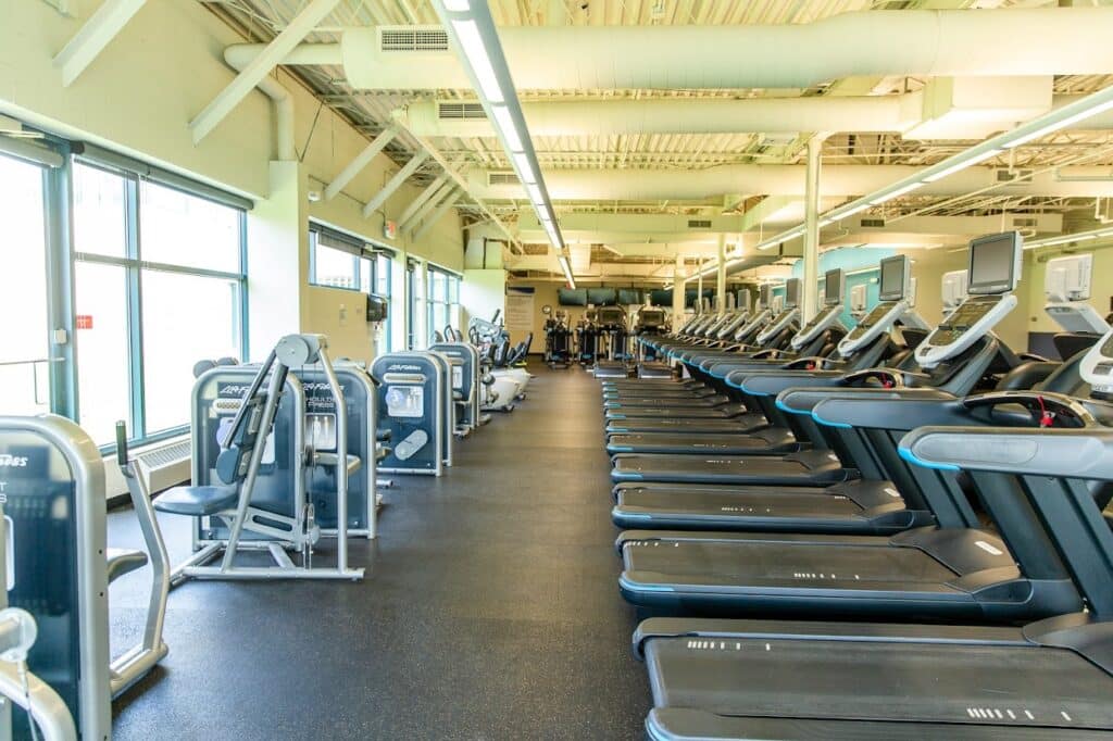 Southwest_Treadmills and leg machines across from them in a large room
