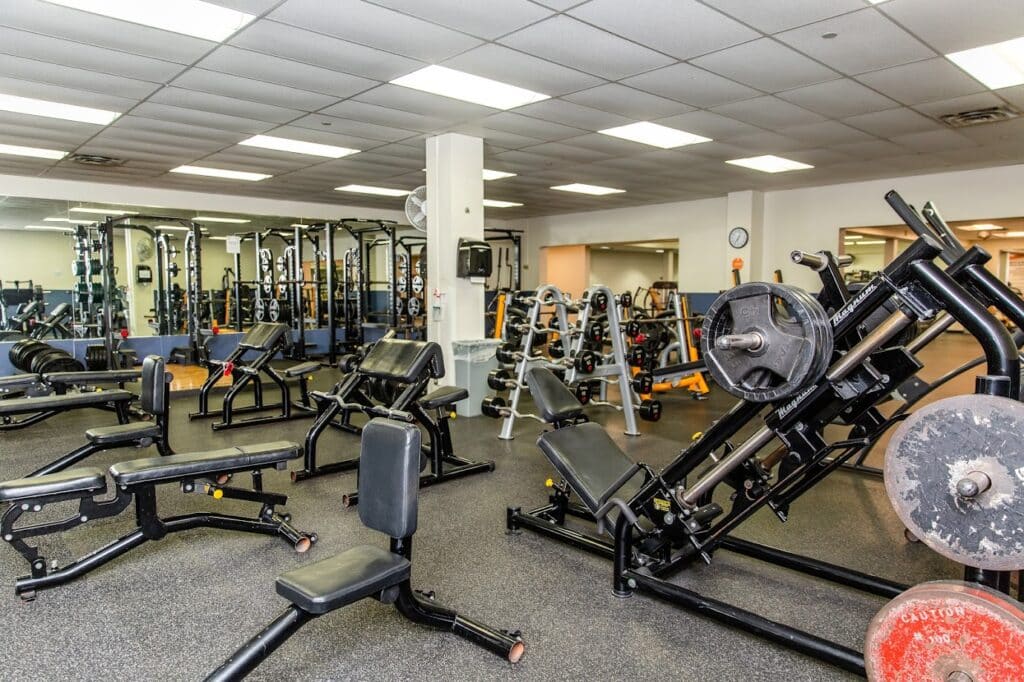 Southwest_Weight room with various weightlifting equipment with a main focus on a leg machine